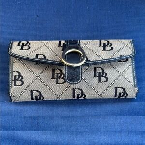 Dooney & Bourke Black and Tan Wallets with Classic Design